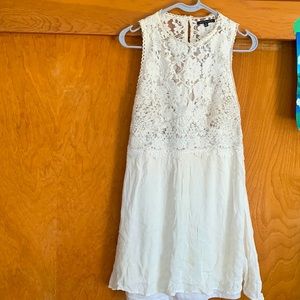 Short floral white dress. Medium sized dress, Staccato Brand.